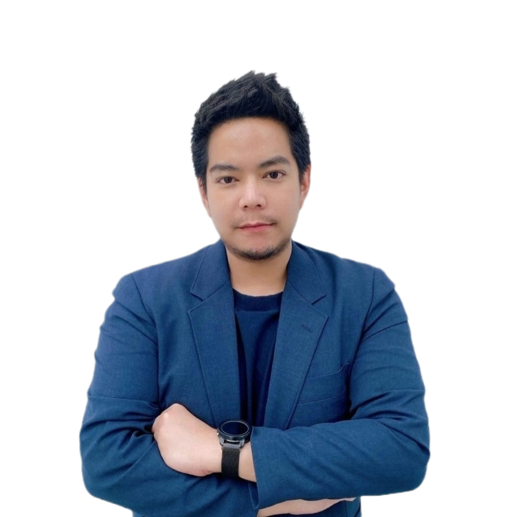 a man in a blue suit is standing with his arms crossed