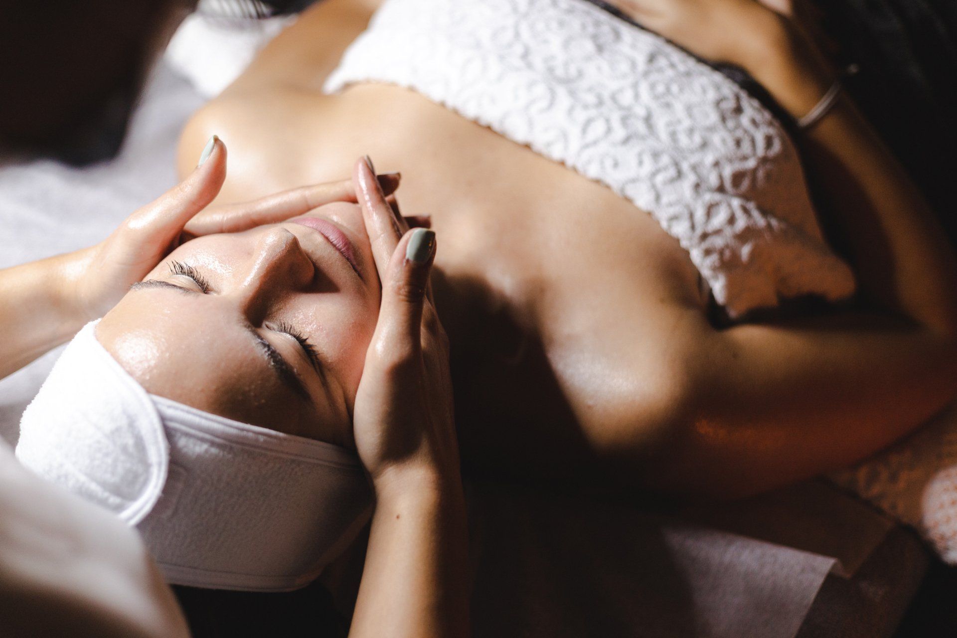 Massaging Woman Face — ROCK, AR — The Body Shoppe Massage & Body Treatment