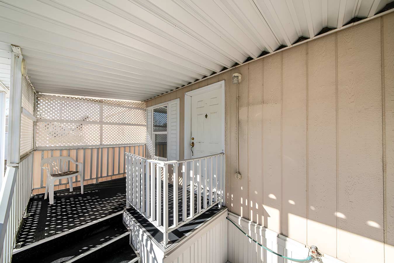 A Mobile Home With a Porch and Stairs Leading Up to It — 2 Deadly Timber & Lattice in Ingham, QLD