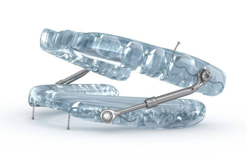 A close up of a sleep apnea device on a white background.