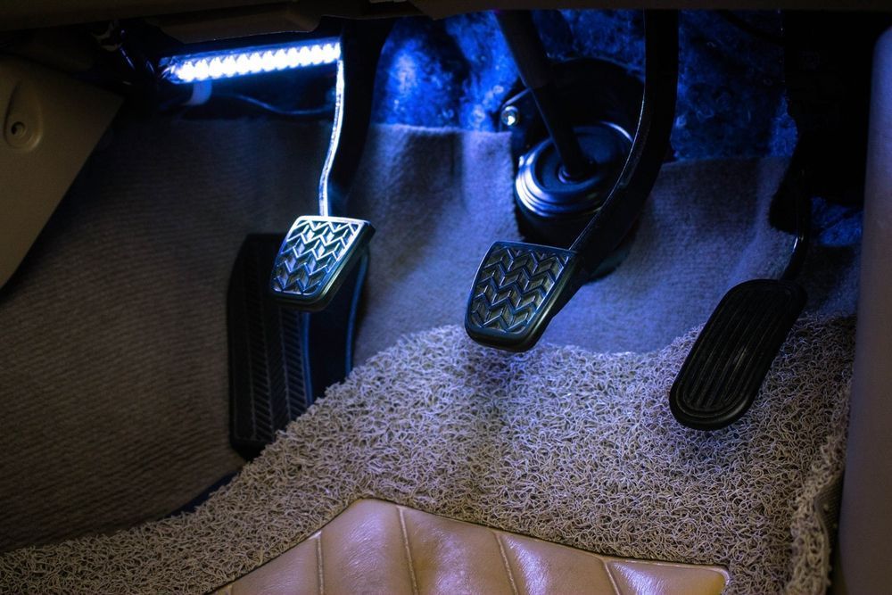 A Person is Pressing the Brake Pedal of a Car — Outlaw Mechanical & Performance In Inverell, NSW