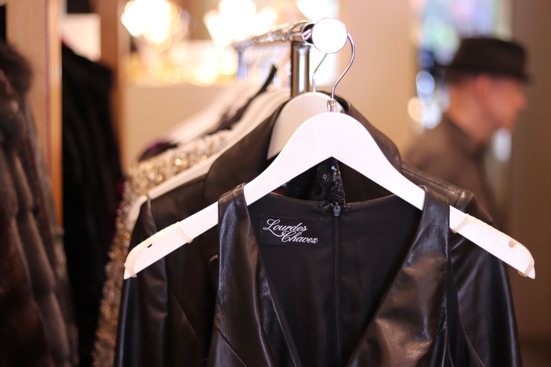 Lourdes Chavez clothes on rack