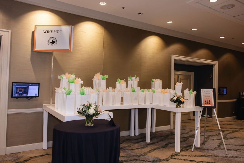 Gift bags on a table at the Brass Ring Luncheon and Fashion Show.