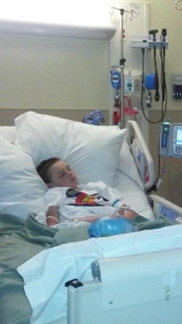 author Wyatt Adams in a hospital bed 