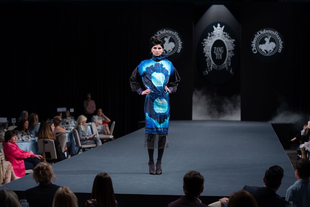 Zang Toi blue graphic dress with fringe bottom on runway