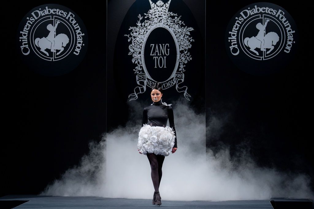Zang Toi black and white short dress with full floral tulle skirt on runway