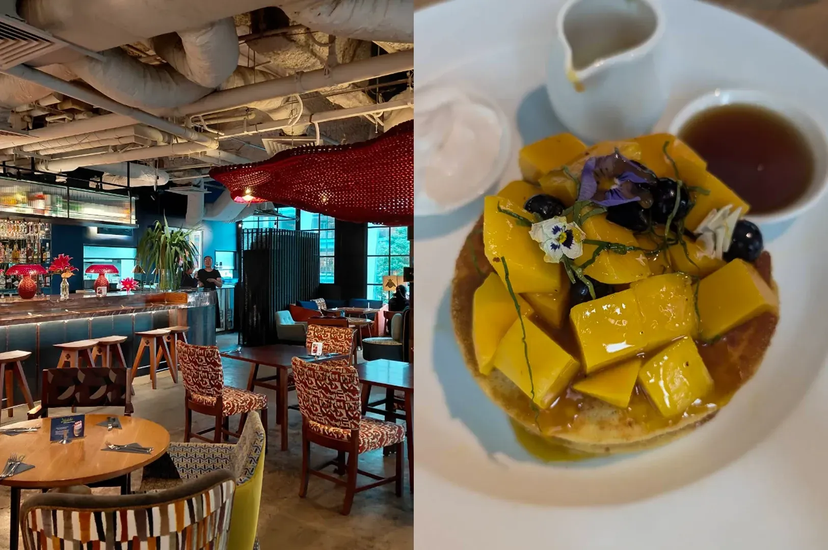 Restaurant interior with colorful seating beside a plated dessert topped with mango and flowers
