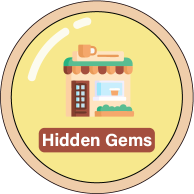 A small café storefront icon with the text “Hidden Gem,” representing lesser-known eateries tucked away from the crowds but worth discovering.