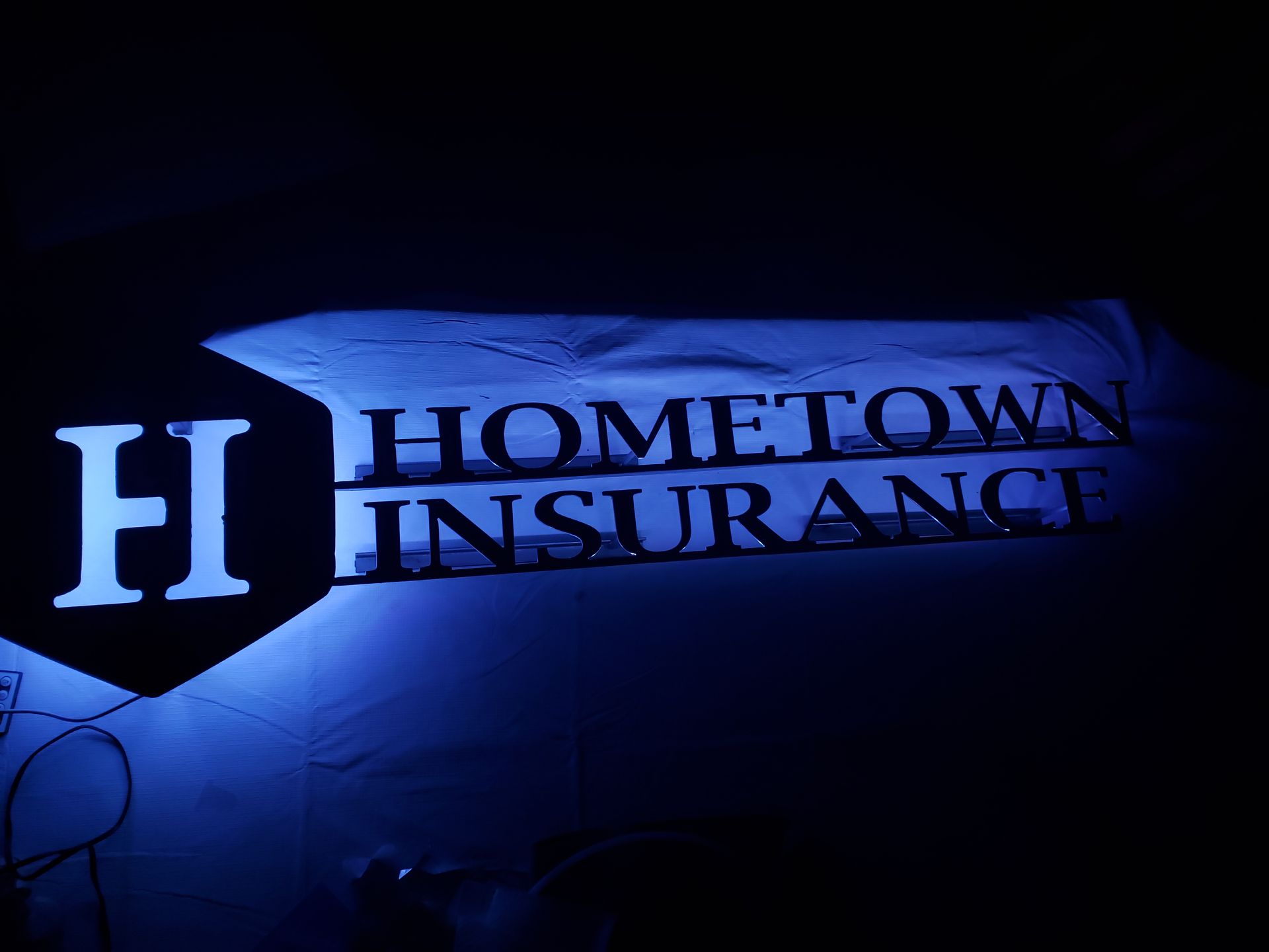 Blue-lit sign: 