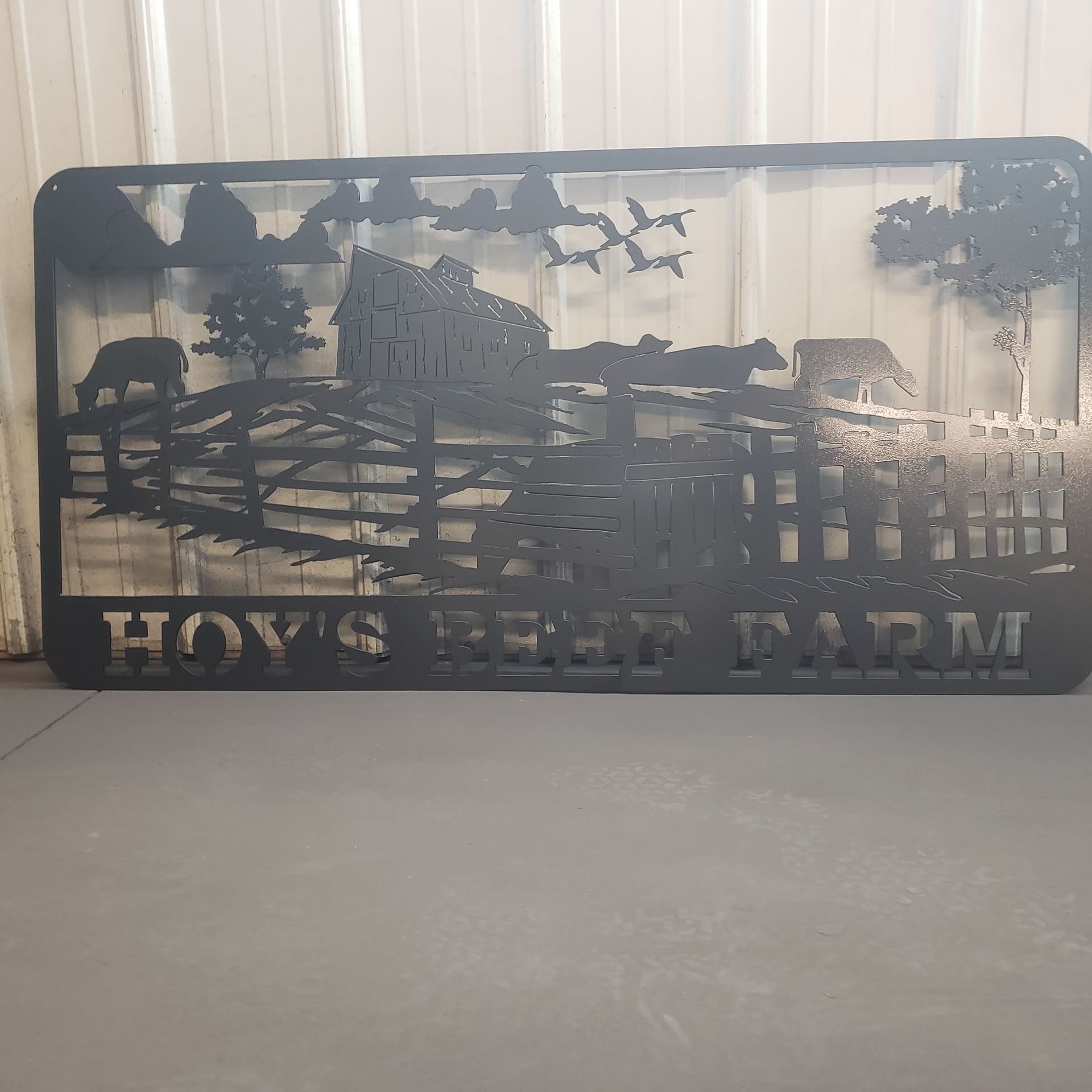 Black metal sign, 