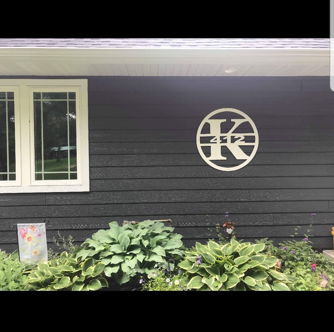 White monogram with the letters 