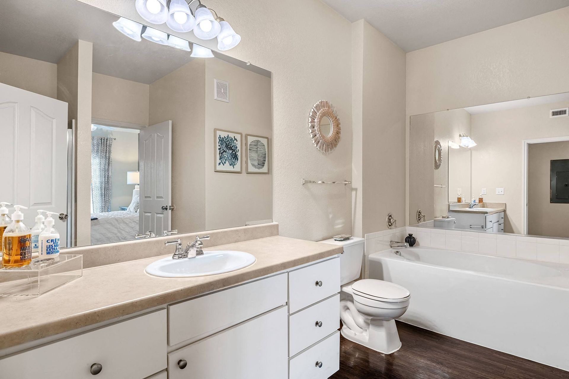 a bathroom with a sink toilet and bathtub