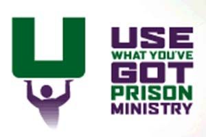 Logo for Use What You've Got Prison Ministry: Green U held up by purple person, purple and green text.