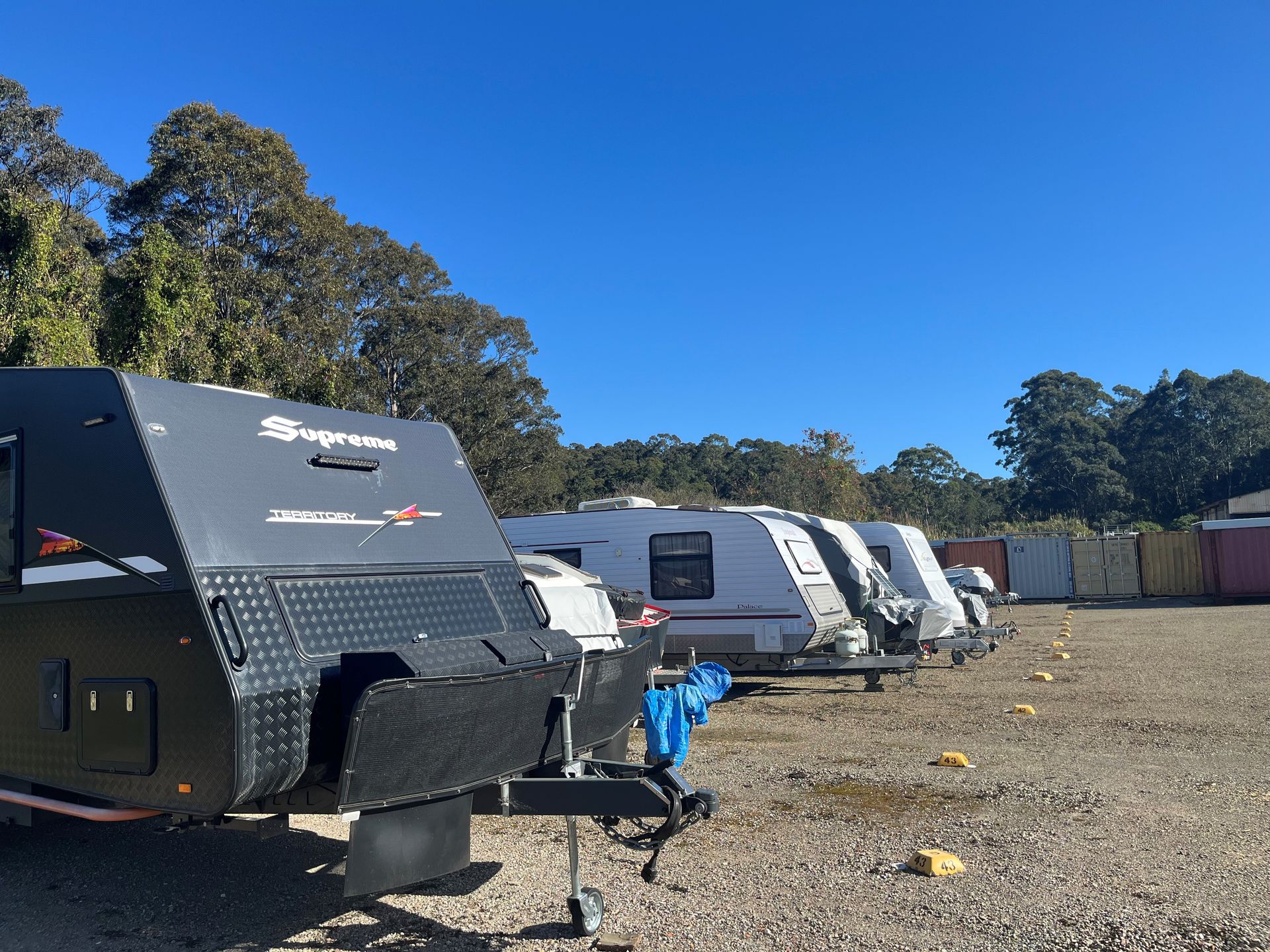 A Row of Caravans Parked Next to Each Other in a Parking Lot — Teralba Business & Storage Park in Teralba, NSW