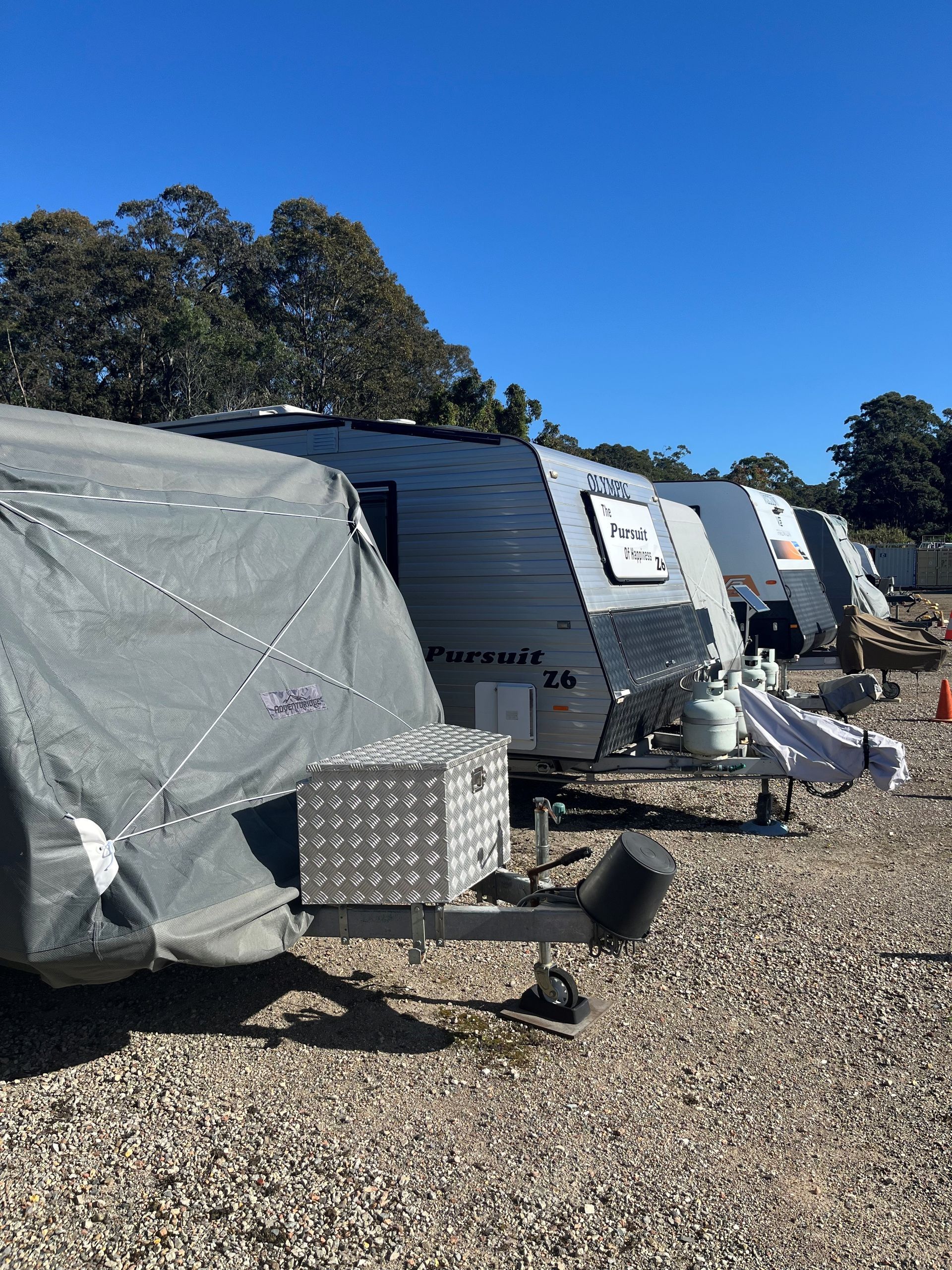 A Row of Caravans Are Parked in a Greenhouse — Teralba Business & Storage Park in Teralba, NSW
