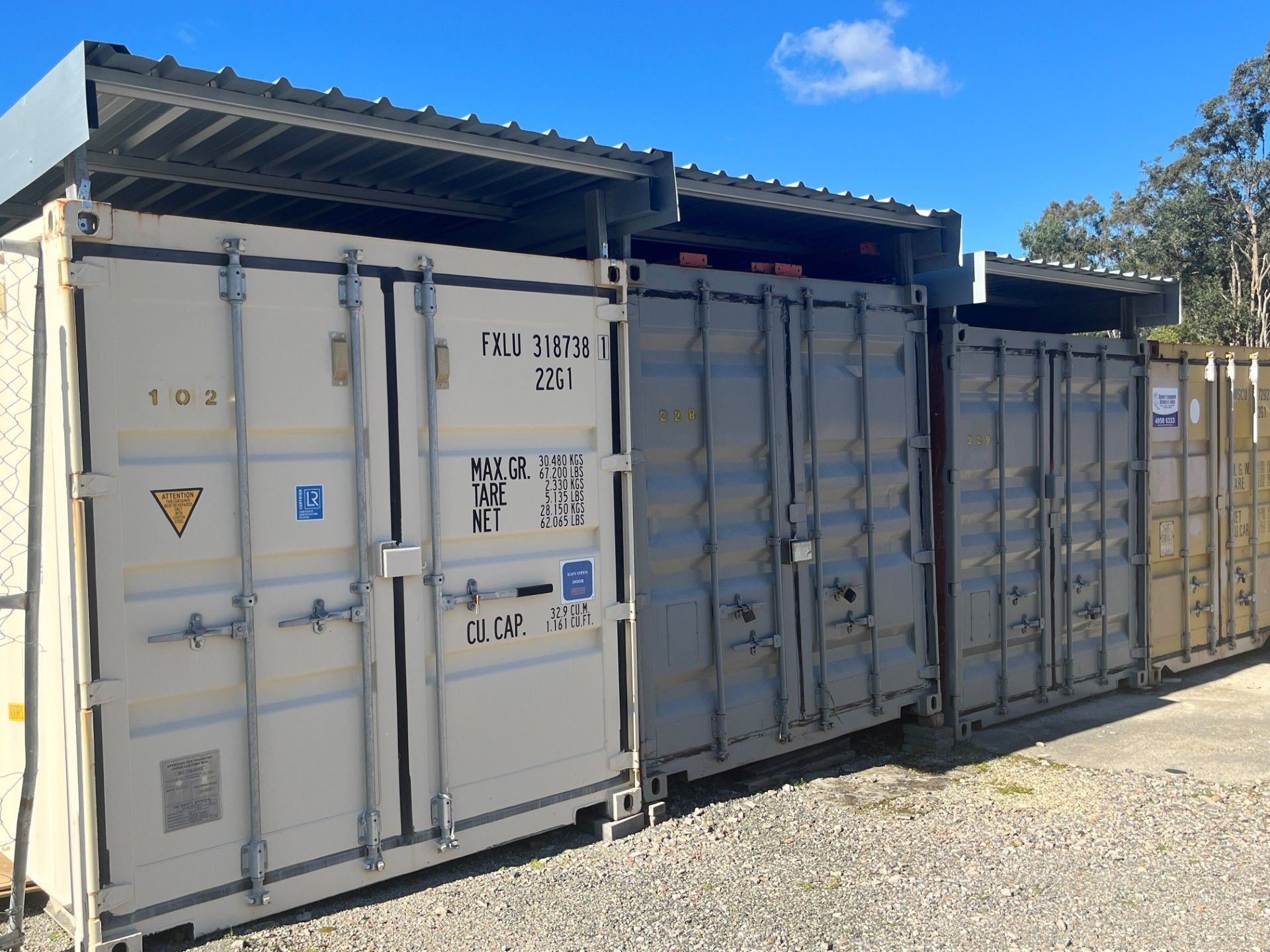 A Row of Containers Are Sitting Next to Each Other in a Parking Lot — Teralba Business & Storage Park in Teralba, NSW