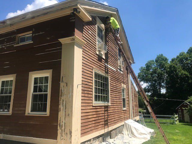 Replacing a House Siding — Waterbury, CT — Armend's Painting and Home Improvement