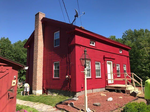 House with Red Paint — Waterbury, CT — Armend's Painting and Home Improvement