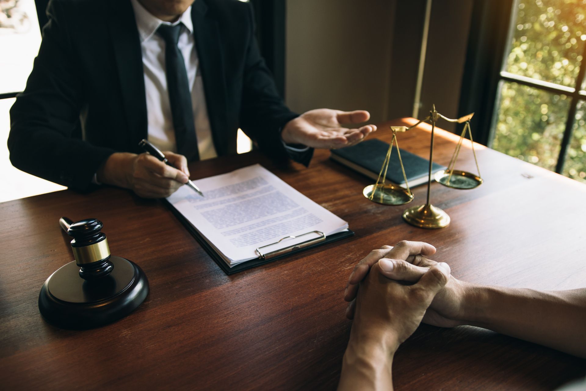 Man speaking with paperwork