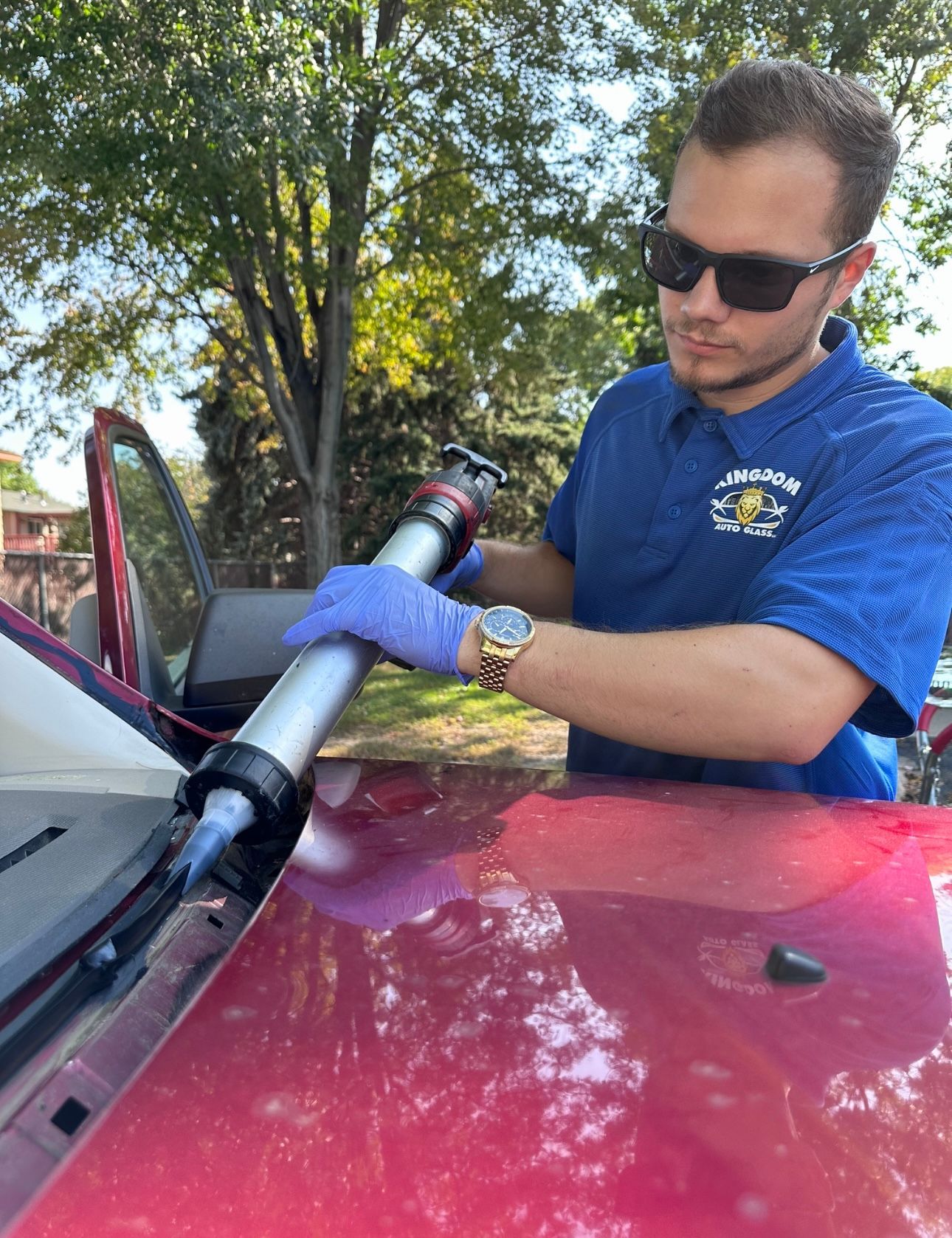 An independent mobile auto glass service van parked in a driveway handling direct insurance billing