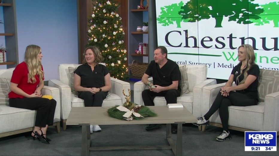 KAKE TV ABC Wichita, KS Four people on the KAKE TV studio set, talking. Chestnut Wellness sign visible.