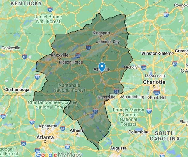 Map showing a green-filled area encompassing parts of Tennessee, North Carolina, and Georgia, with labeled cities and national forests.