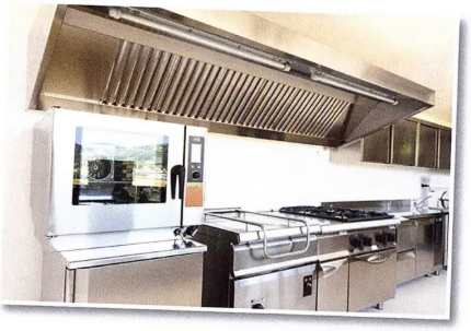 A kitchen with stainless steel appliances and a microwave oven A kitchen with stainless steel appliances and a microwave oven
