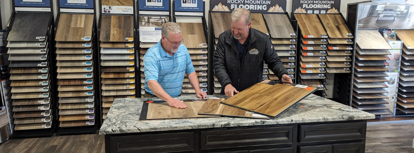 2 people looking at flooring design