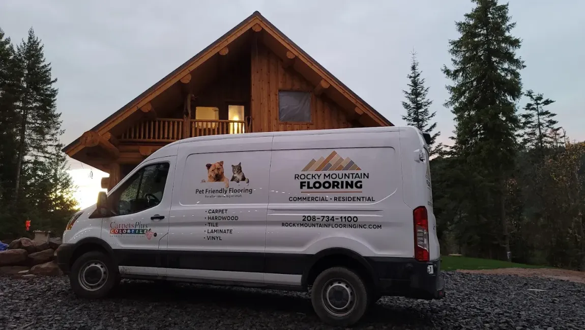 Rocky Mountain Flooring van parked in front of a customers home