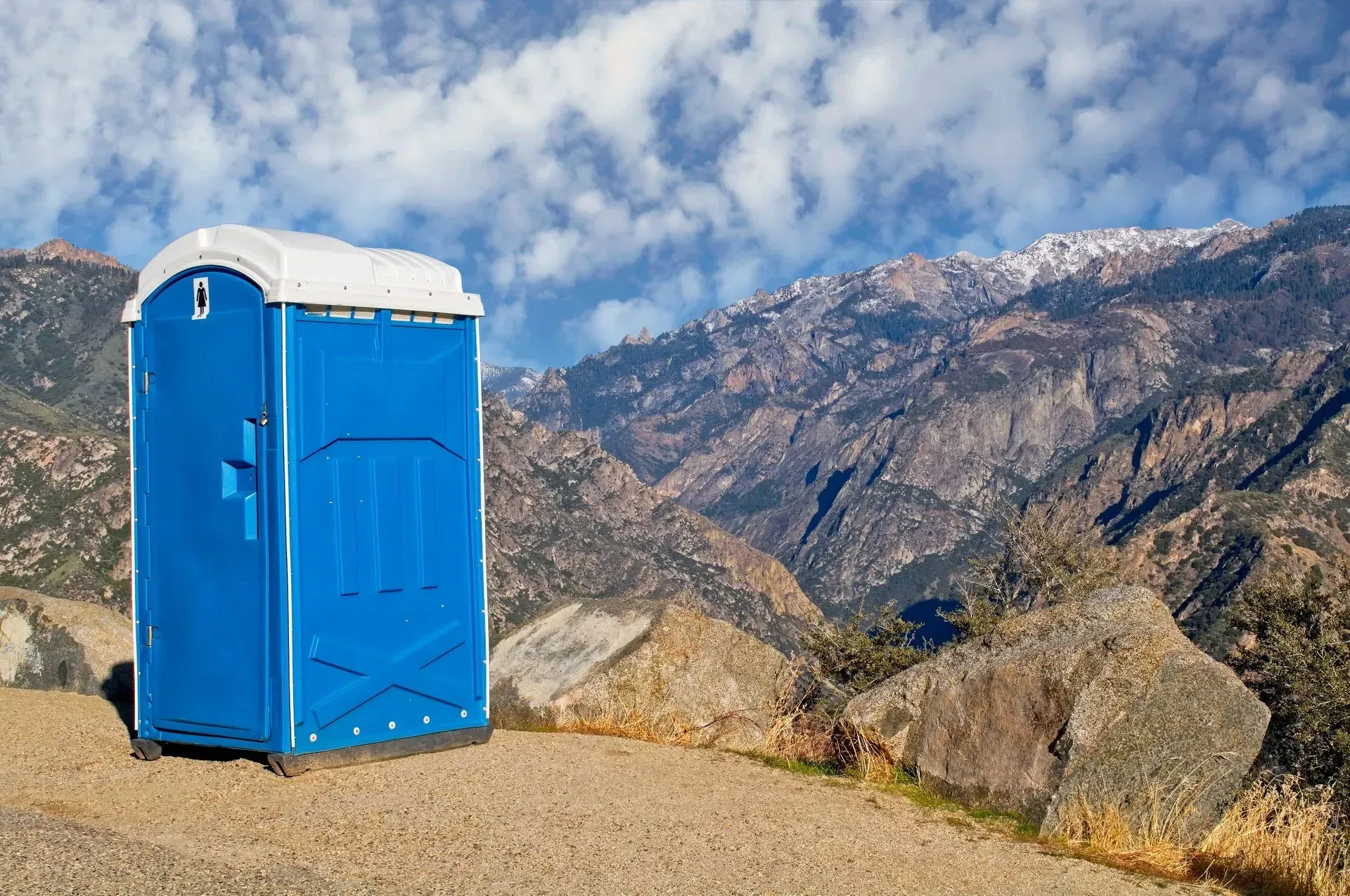 A Blue Portable Toilet