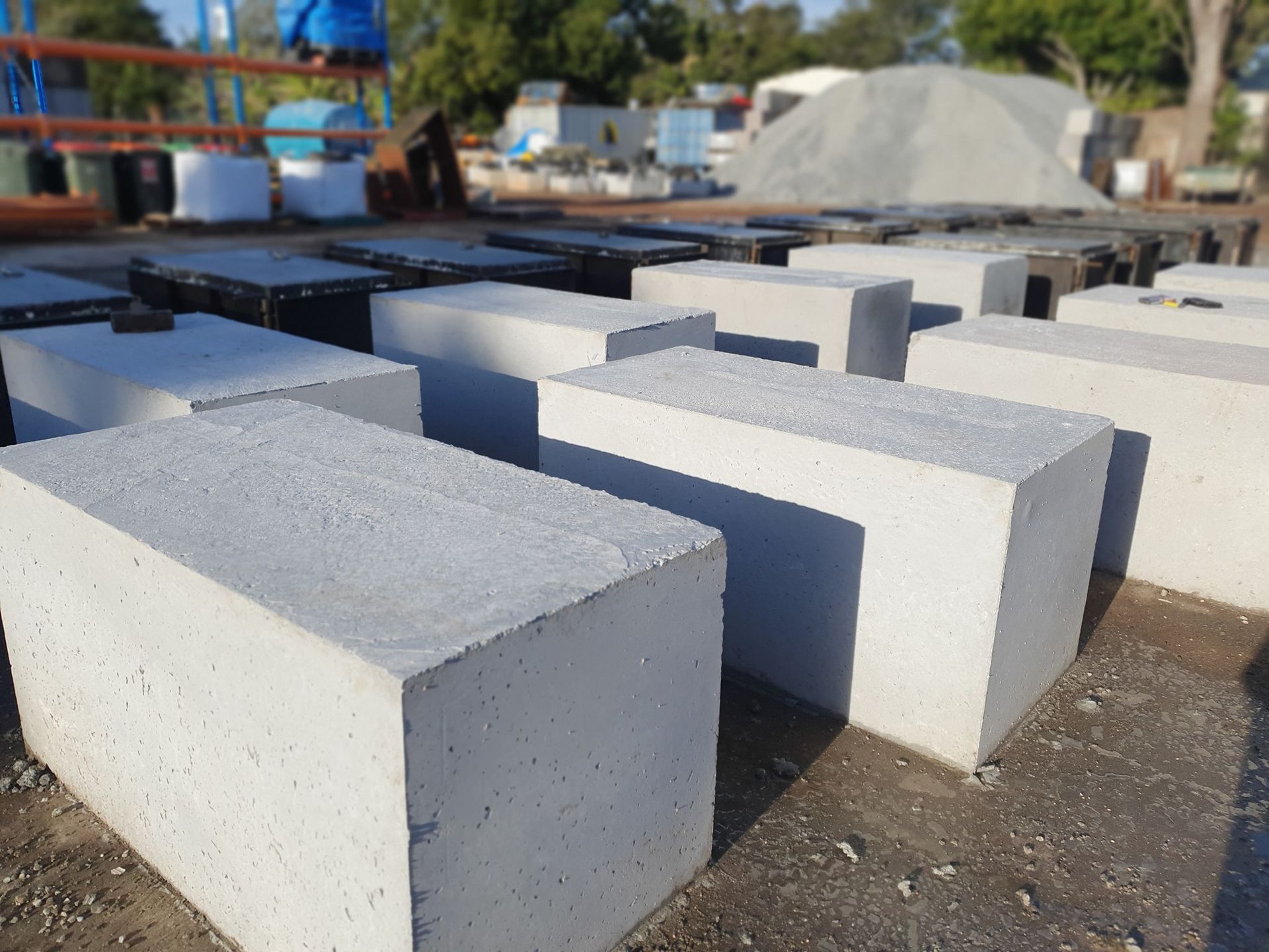 Rows Of Grey Concrete Blocks Outdoors — Port Landscape Supplies in Port Macquarie, NSW
