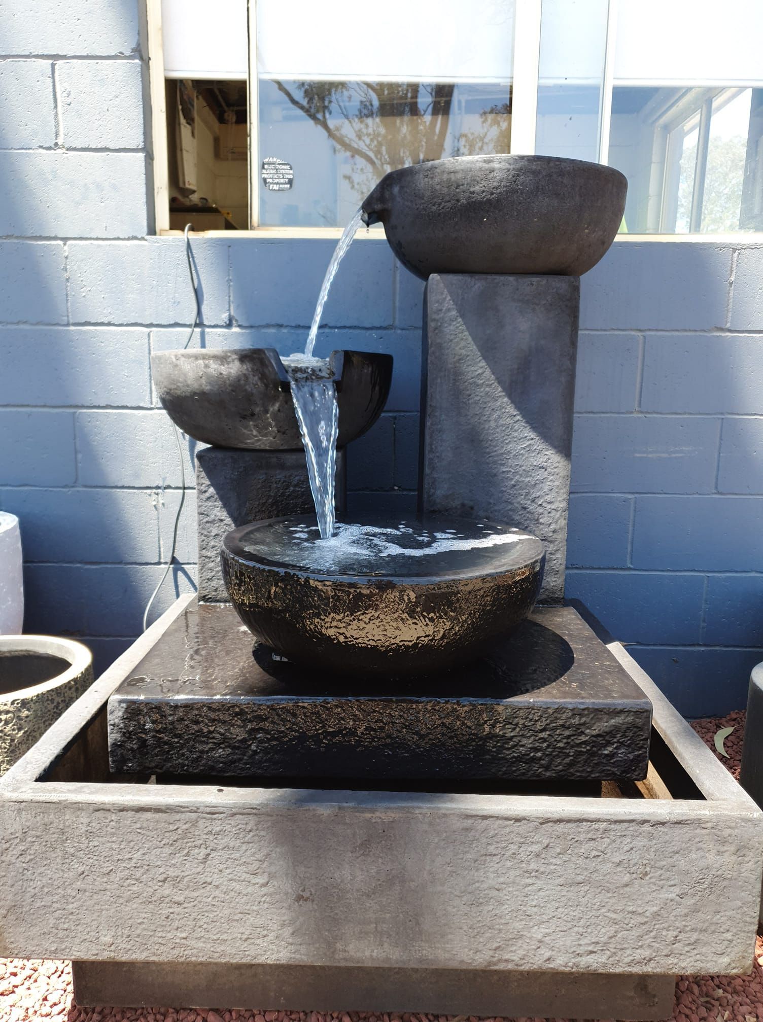 Water Fountain with Dark Bowls and A Rectangular Basin — Port Landscape Supplies in Port Macquarie, NSW