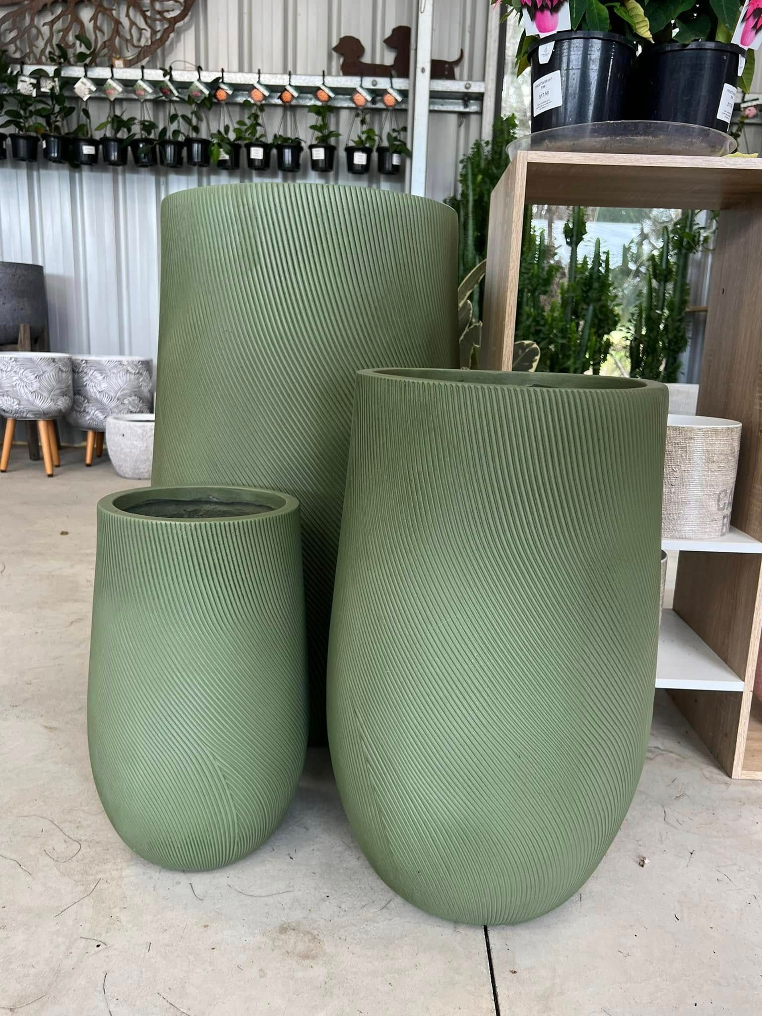 Three Green, Textured Plant Pots In A Store — Port Landscape Supplies in Laurieton, NSW