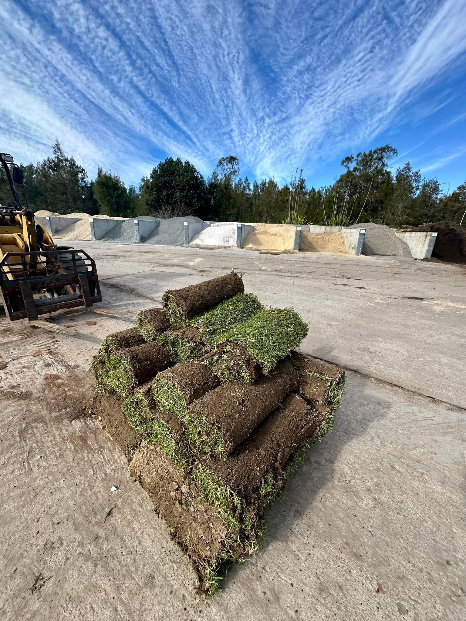 Rolls of Turf Stacked on Concrete — Port Landscape Supplies in Port Macquarie, NSW