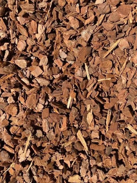 Brown Wood Chips, Mulch, Covering the Ground — Port Landscape Supplies in Port Macquarie, NSW