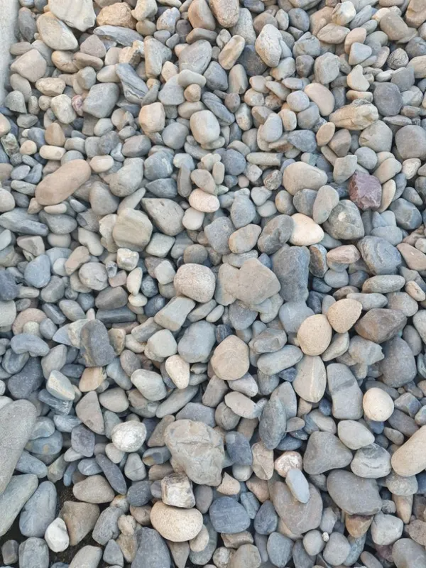 Pile of Smooth, Rounded River Rocks — Port Landscape Supplies in Port Macquarie, NSW