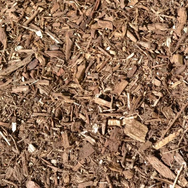 Brown Wood Chip Mulch Shown In A Close-Up Texture For Gardening or Landscaping — Port Landscape Supplies in Laurieton, NSW