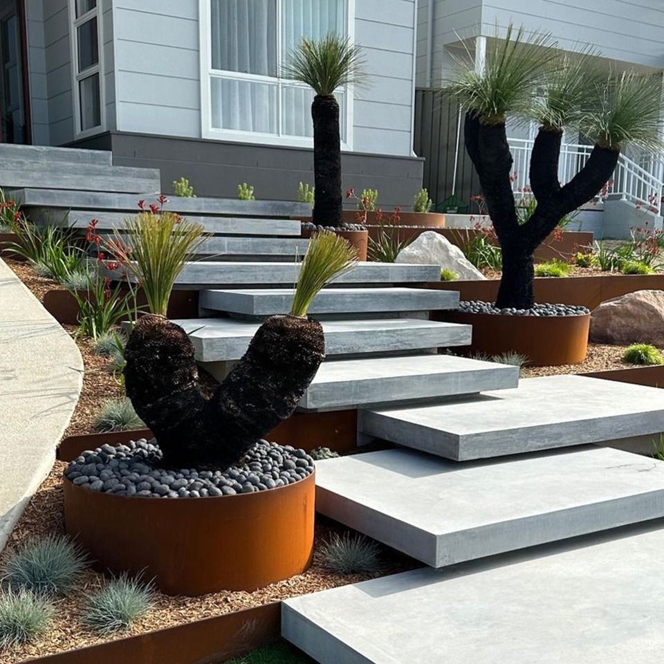 Modern Tiered Garden With Stone Steps — Port Landscape Supplies in Port Macquarie, NSW