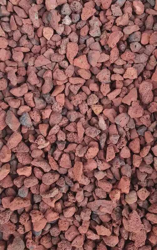 Pile of small reddish-brown rocks or gravel filling the frame