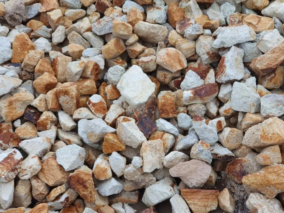 Pile Of Tan and White Rocks With Some Brown Rust-Coloured Areas — Port Landscape Supplies in Wauchope, NSW