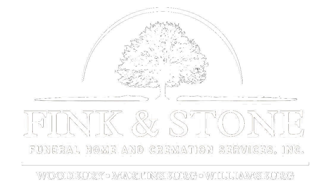 Fink & Stone logo with tree image. Company offers design and remodeling services.