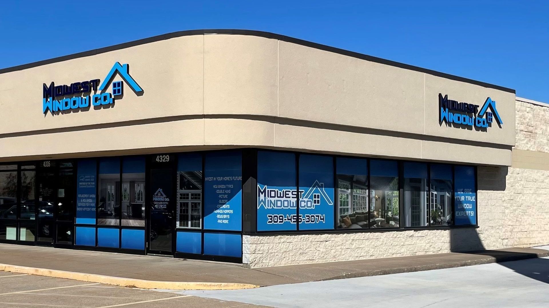 Exterior of a building with blue and white signage: Exterior of a building with blue and white signage: