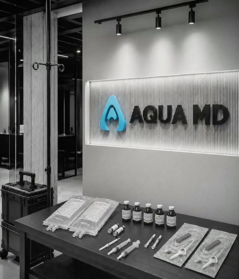 Supplies for AQUA MD surgical hydration and recovery program with IV fluids, medications, and infusion equipment.