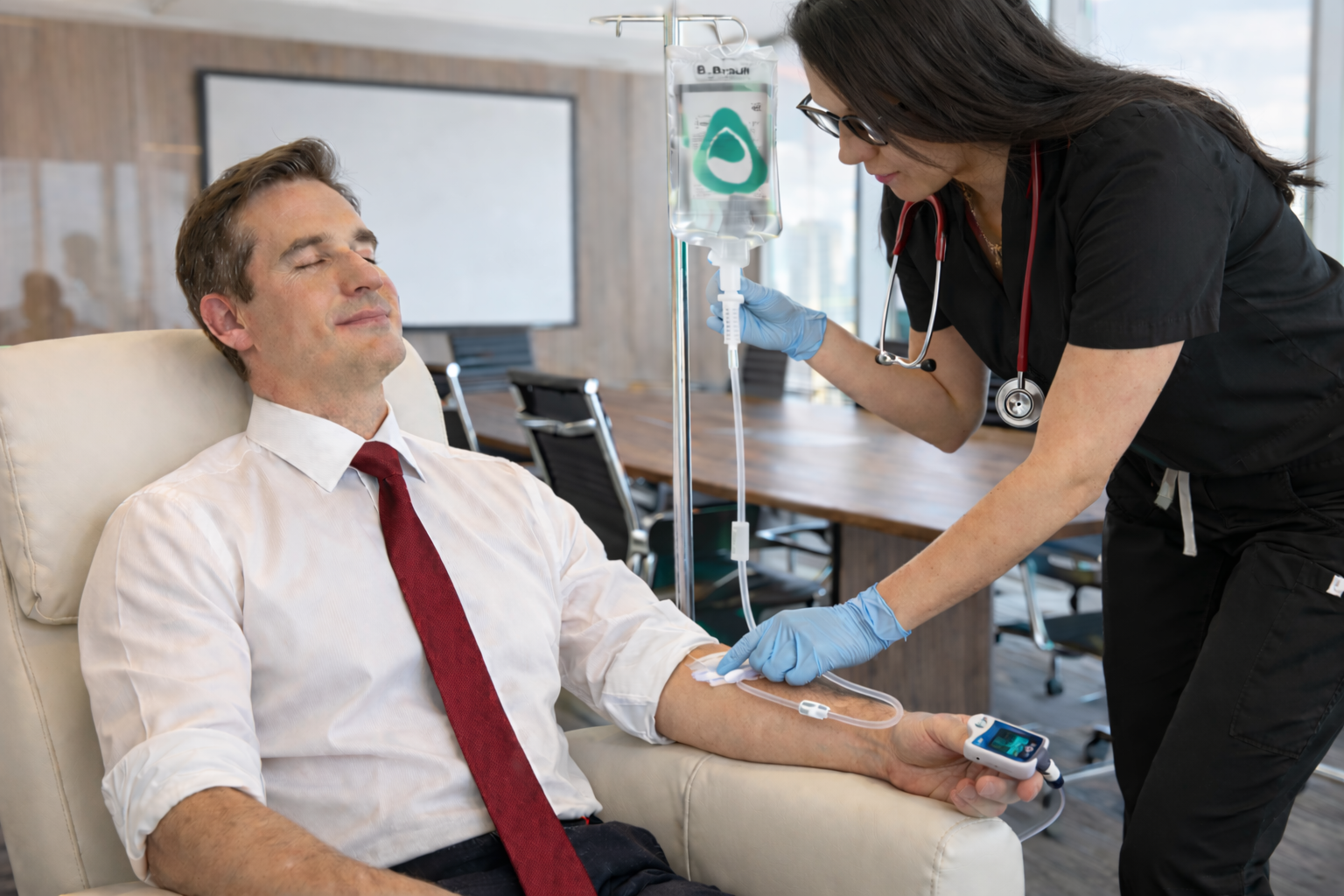Nurse providing in-home therapy by AQUA MD Mobile IV in Bremerton