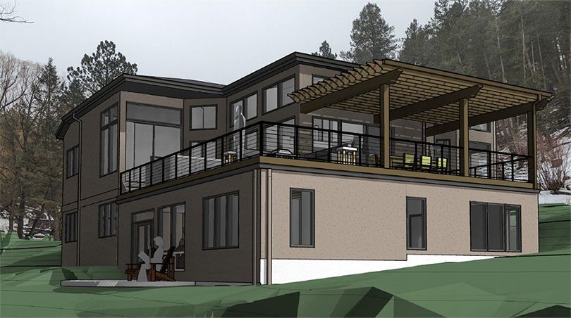 Modern two-story home with a deck overlooking a landscape. Brown and tan exterior.