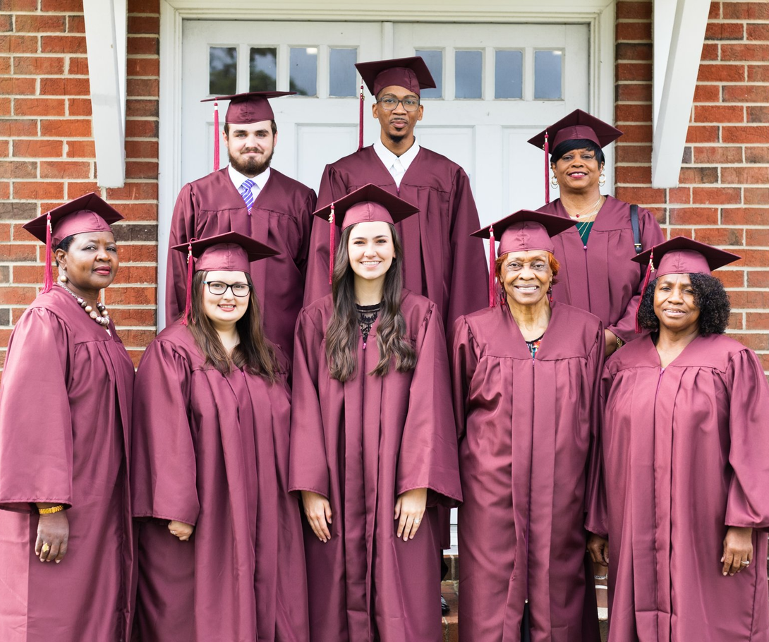 Heritage Bible College Graduates in Caps and Gowns
