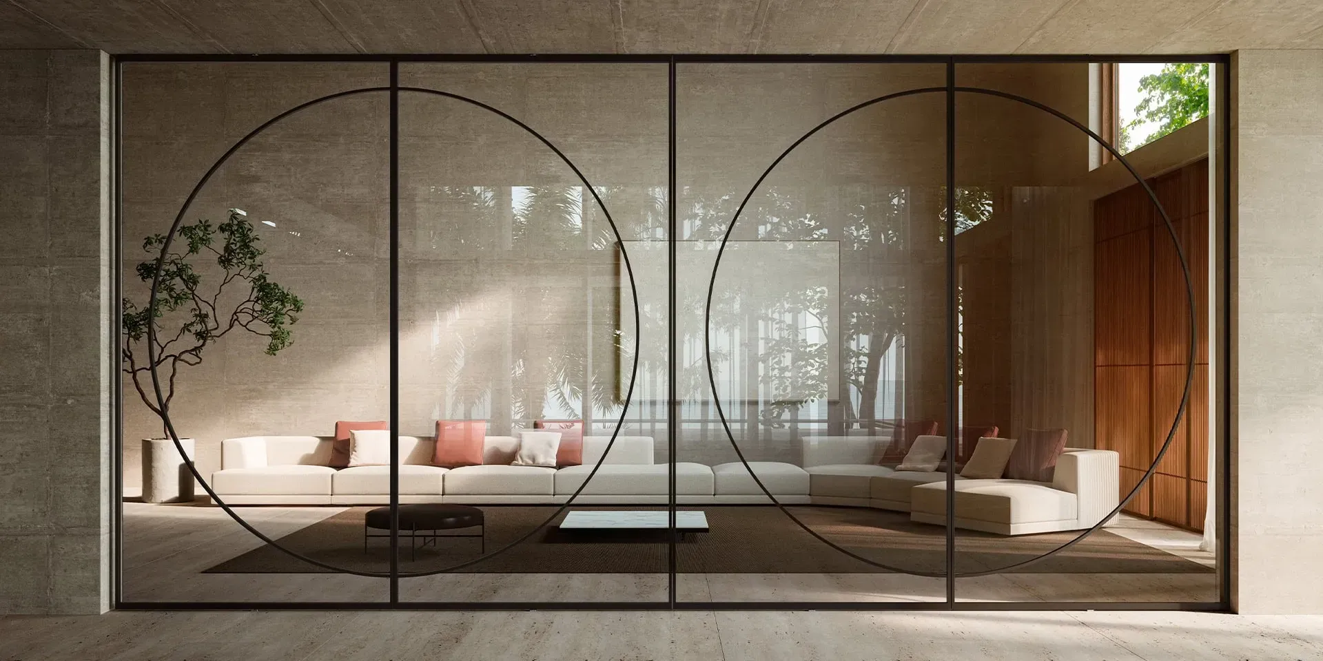 Modernes Wohnzimmer mit raumhohen Glastüren mit kreisförmigem Design. Ein Sofagarnitur mit bunten Kissen.