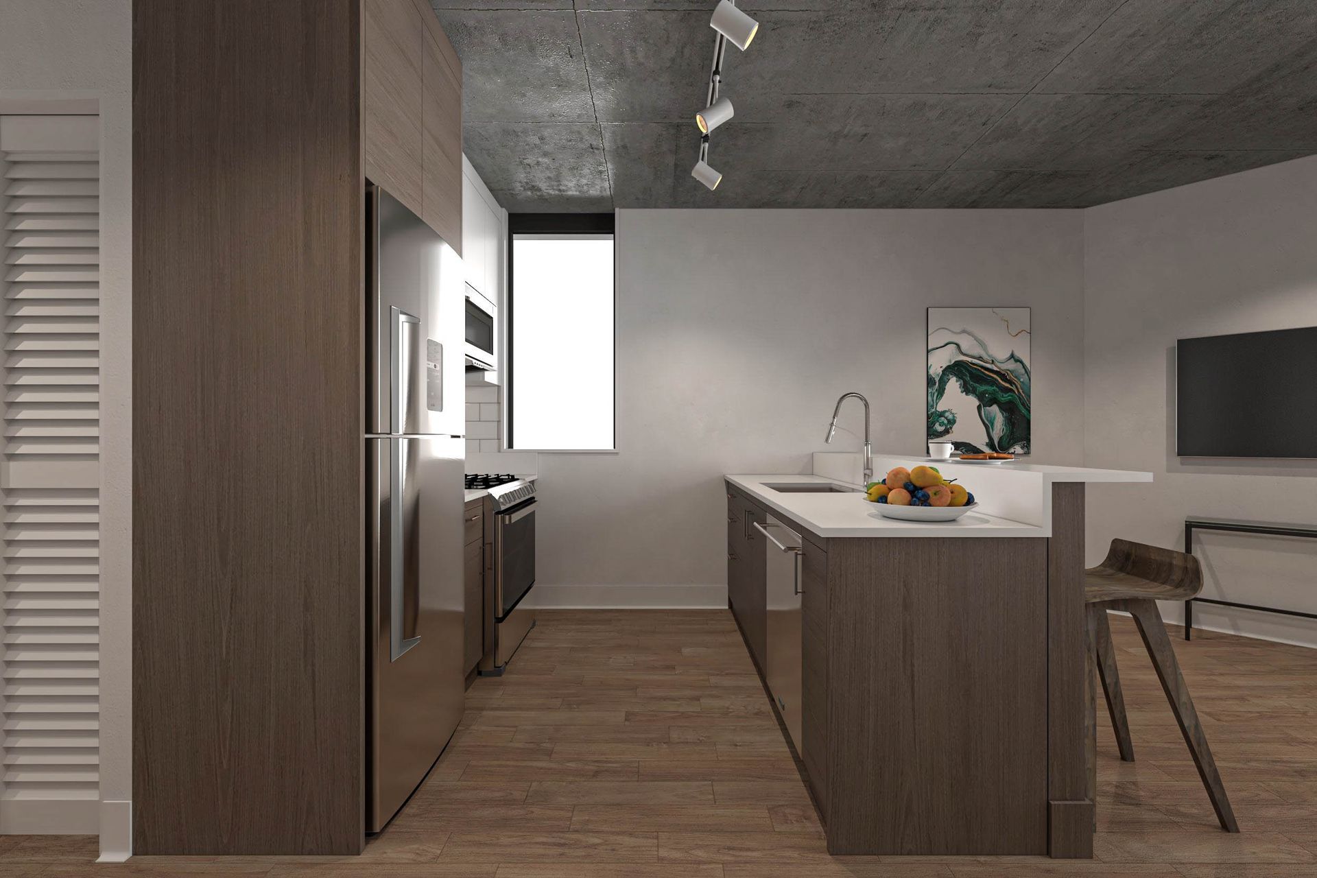 Modern kitchen with wood cabinets, island, fruit bowl, window, and dining area.
