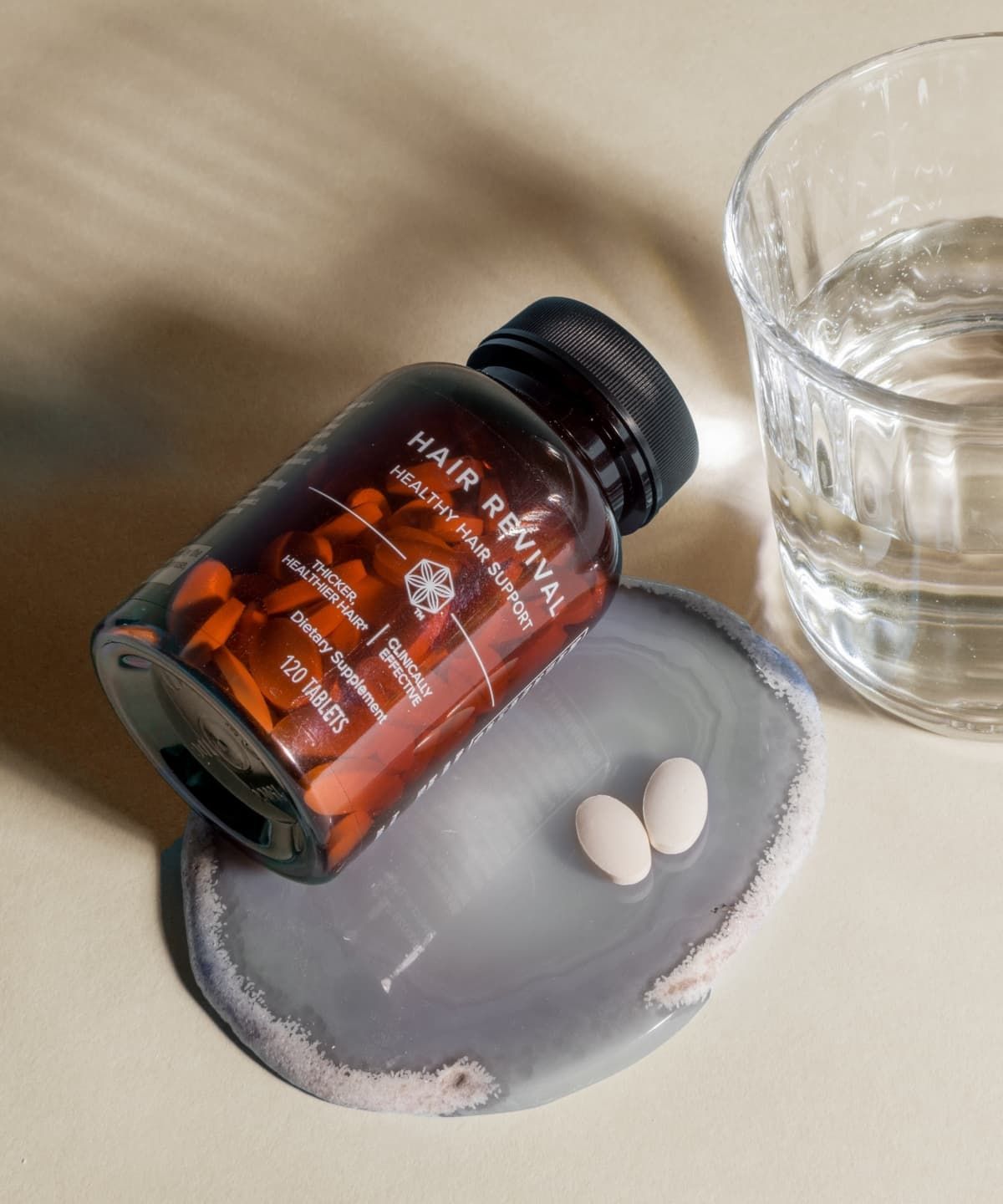 A bottle of hair revival healthy hair support