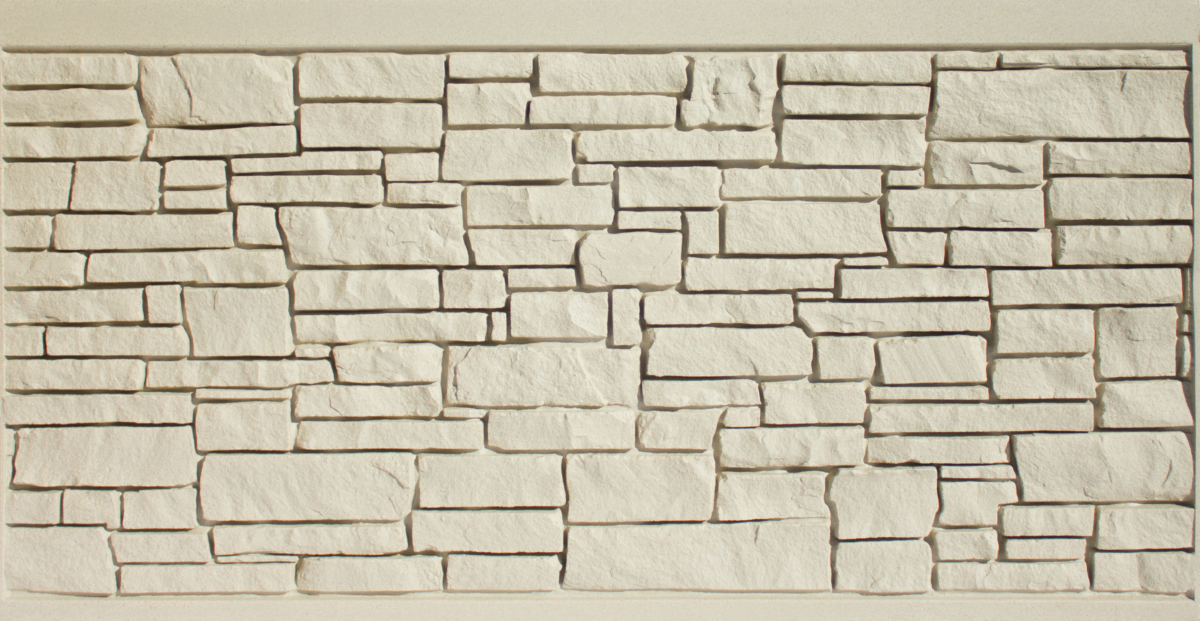 Stone wall panel with rectangular, light-colored stones in a random pattern.